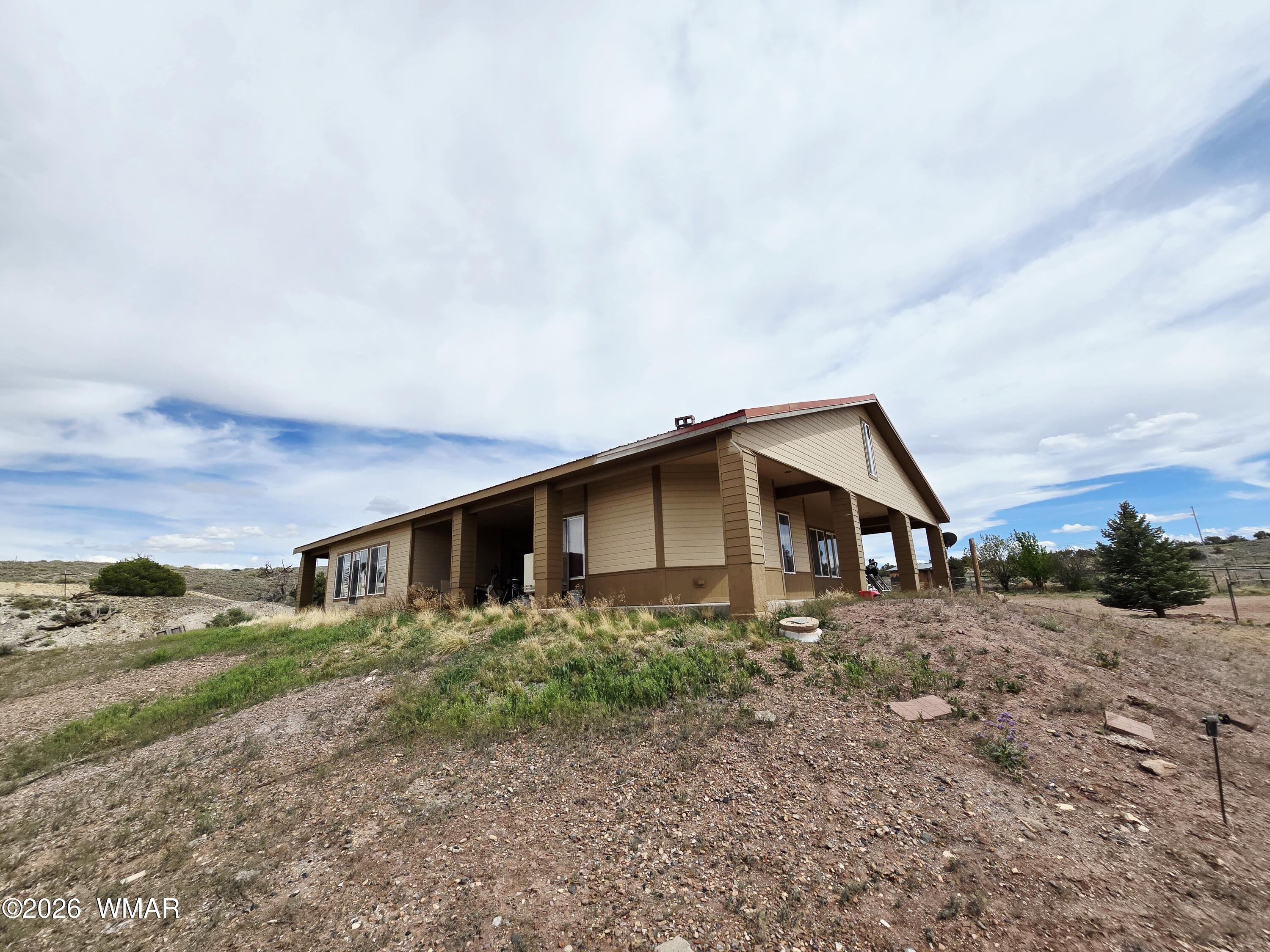 9046 Miller Trail Snowflake, AZ 85937 - Photo 34 of 34 a front view of a house with garden
