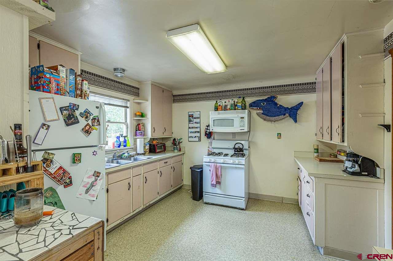 3575 Main Avenue Durango, CO 81301 - Photo 11 of 32 a room with storage and utility