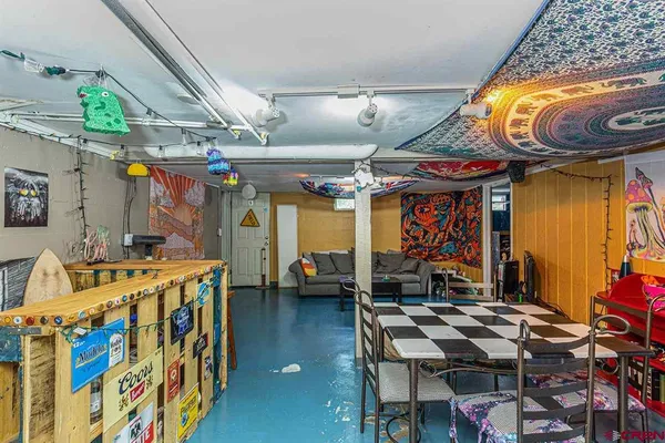 a kitchen with stainless steel appliances granite countertop a stove and a refrigerator