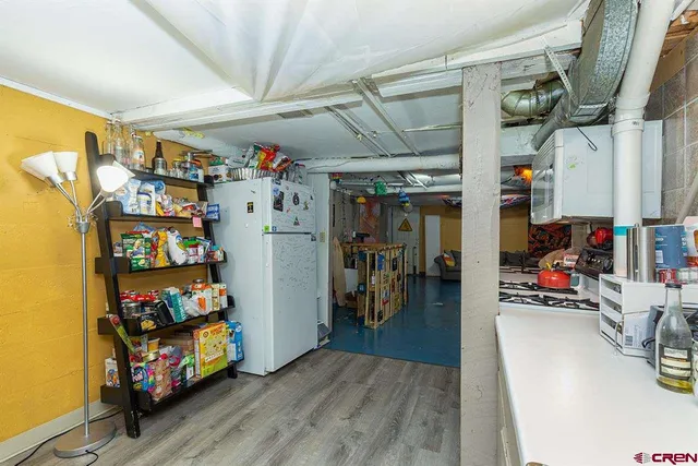 a room with lots of different colored cloths