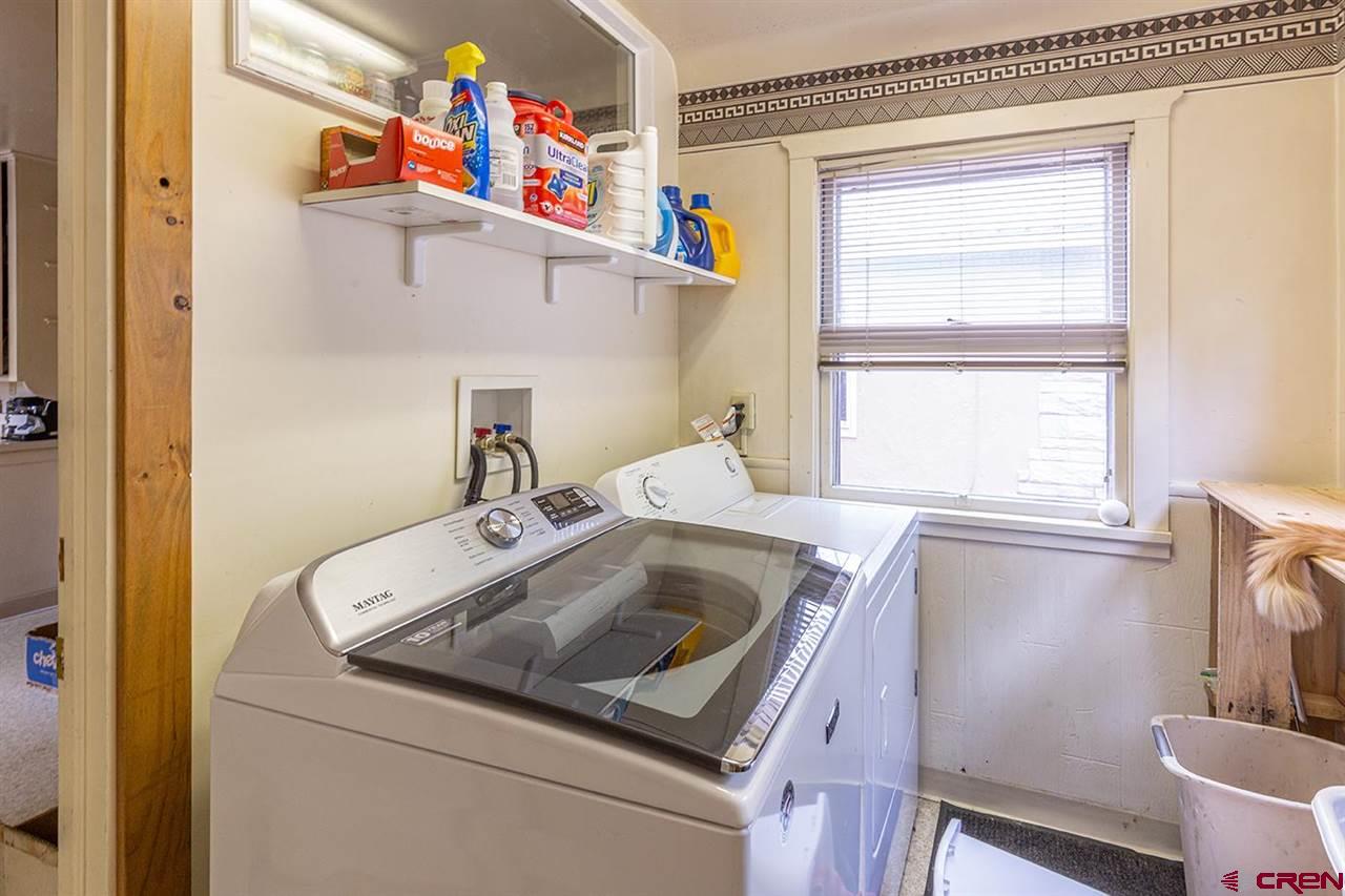 3575 Main Avenue Durango, CO 81301 - Photo 22 of 32 a utility room with a window dryer and washer