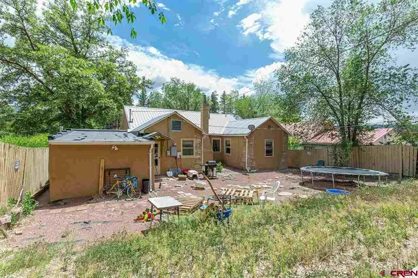 a car parked in front of a house