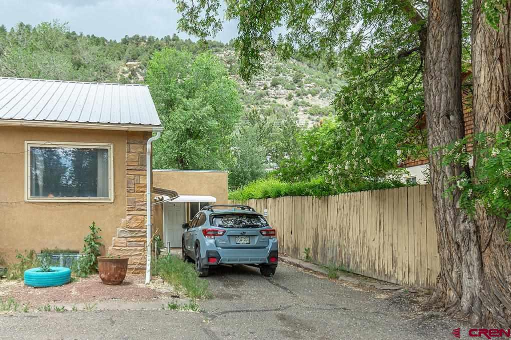 3575 Main Avenue Durango, CO 81301 - Photo 28 of 32 a car parked in front of a house