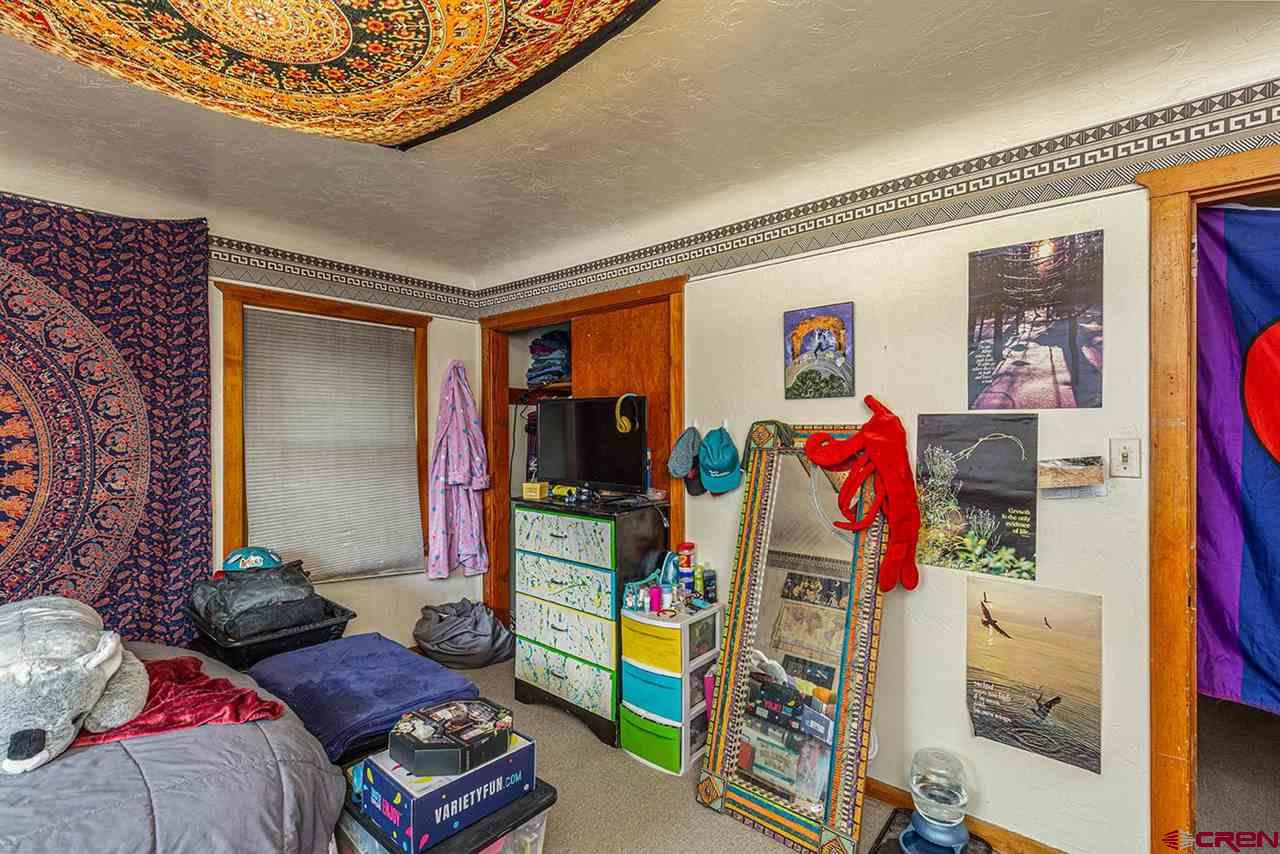 3575 Main Avenue Durango, CO 81301 - Photo 6 of 32 a living room with furniture and a lamp