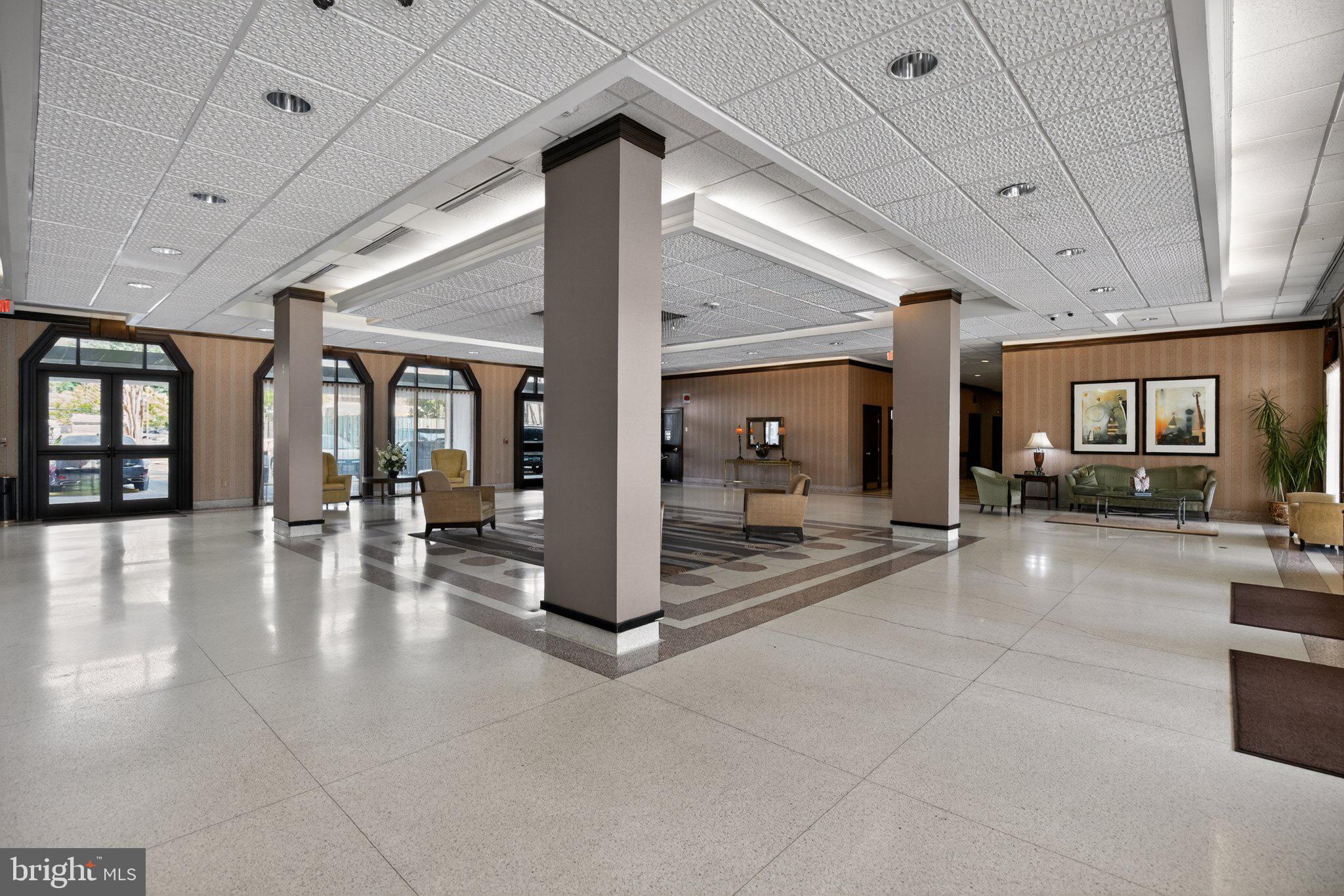 700 7th Street Southwest, Unit 526 Washington, DC 20024 - Photo 4 of 33 Spacious lobby with modern elegance.
