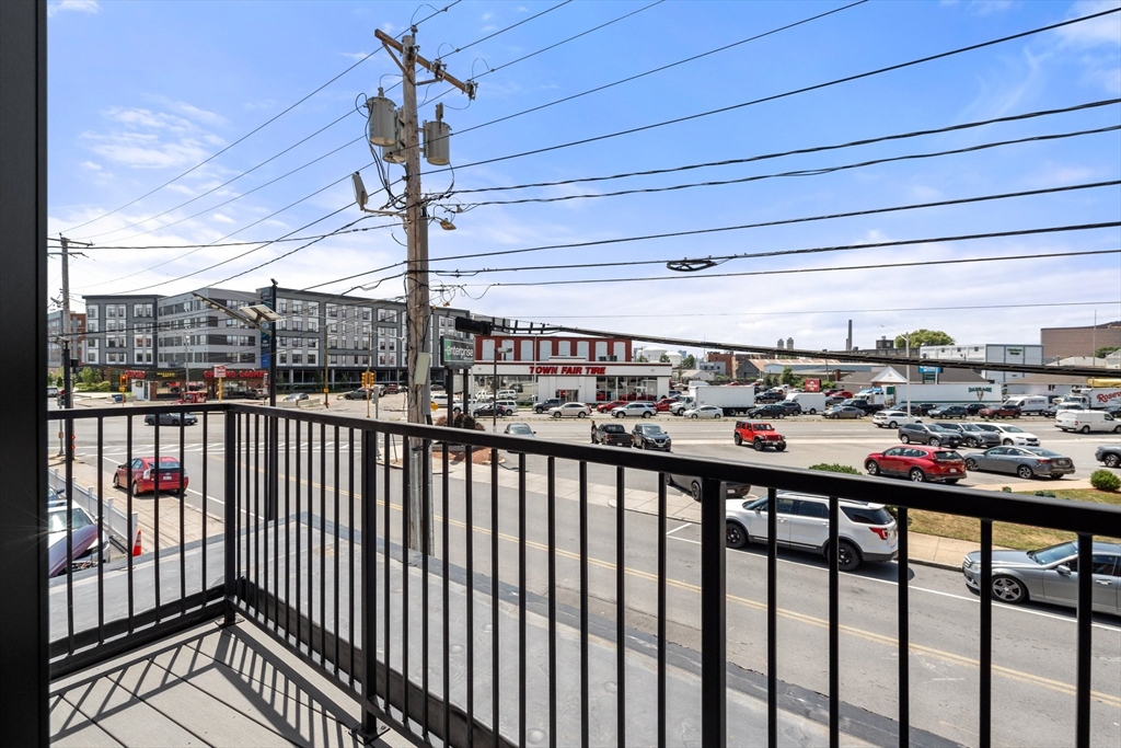 523 2nd Street, Unit 403 Everett, MA 02149 - Photo 10 of 10 a view of city from a balcony