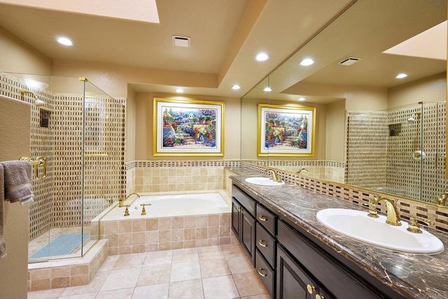 front view of a building with a tree