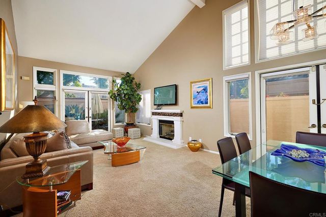 a kitchen with stainless steel appliances granite countertop a sink and a stove