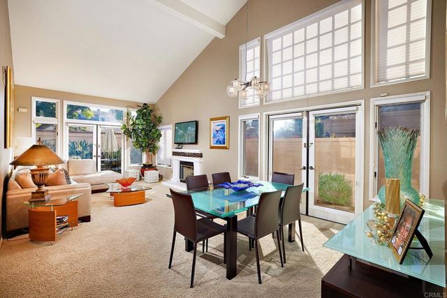 a kitchen with a sink stove top oven and cabinets