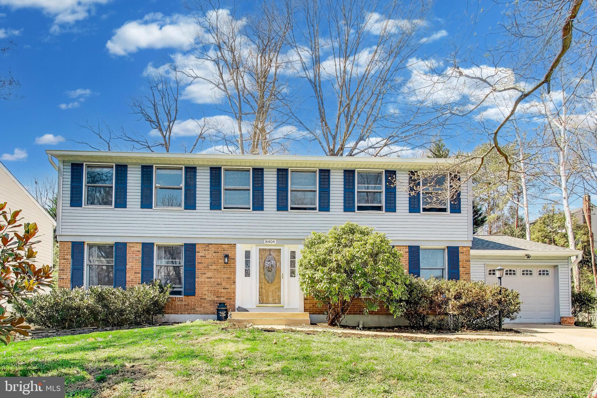 8404 Chillum Court Springfield, VA 22153 - Photo 2 of 56 front view of a house with a yard