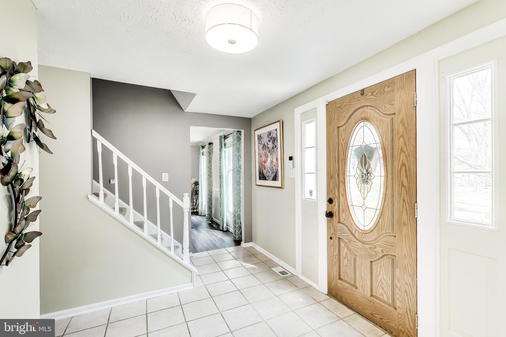 8404 Chillum Court Springfield, VA 22153 - Photo 4 of 56 Welcoming entryway with natural light.