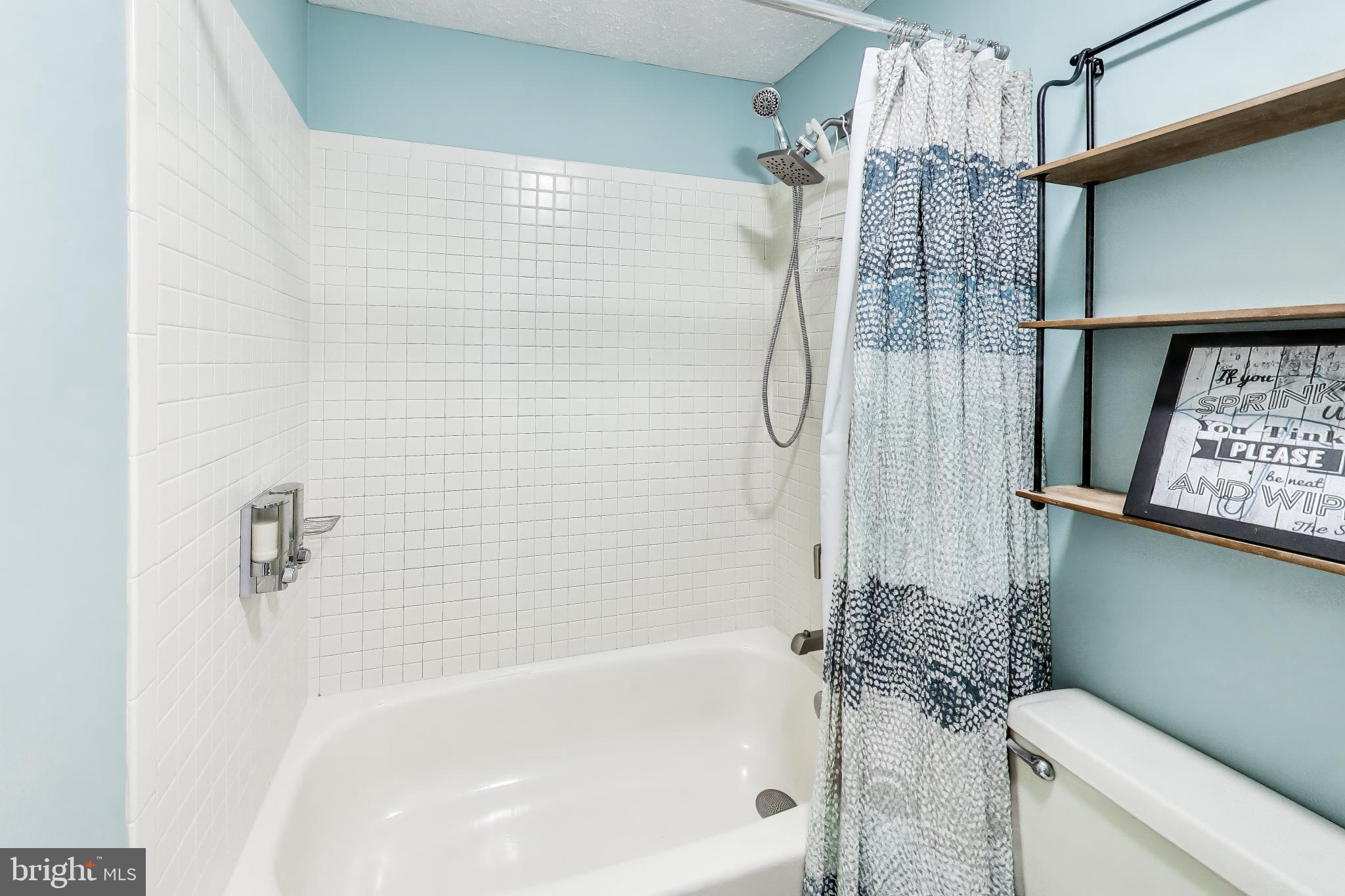 8404 Chillum Court Springfield, VA 22153 - Photo 42 of 56 Serene bathroom retreat with modern flair.