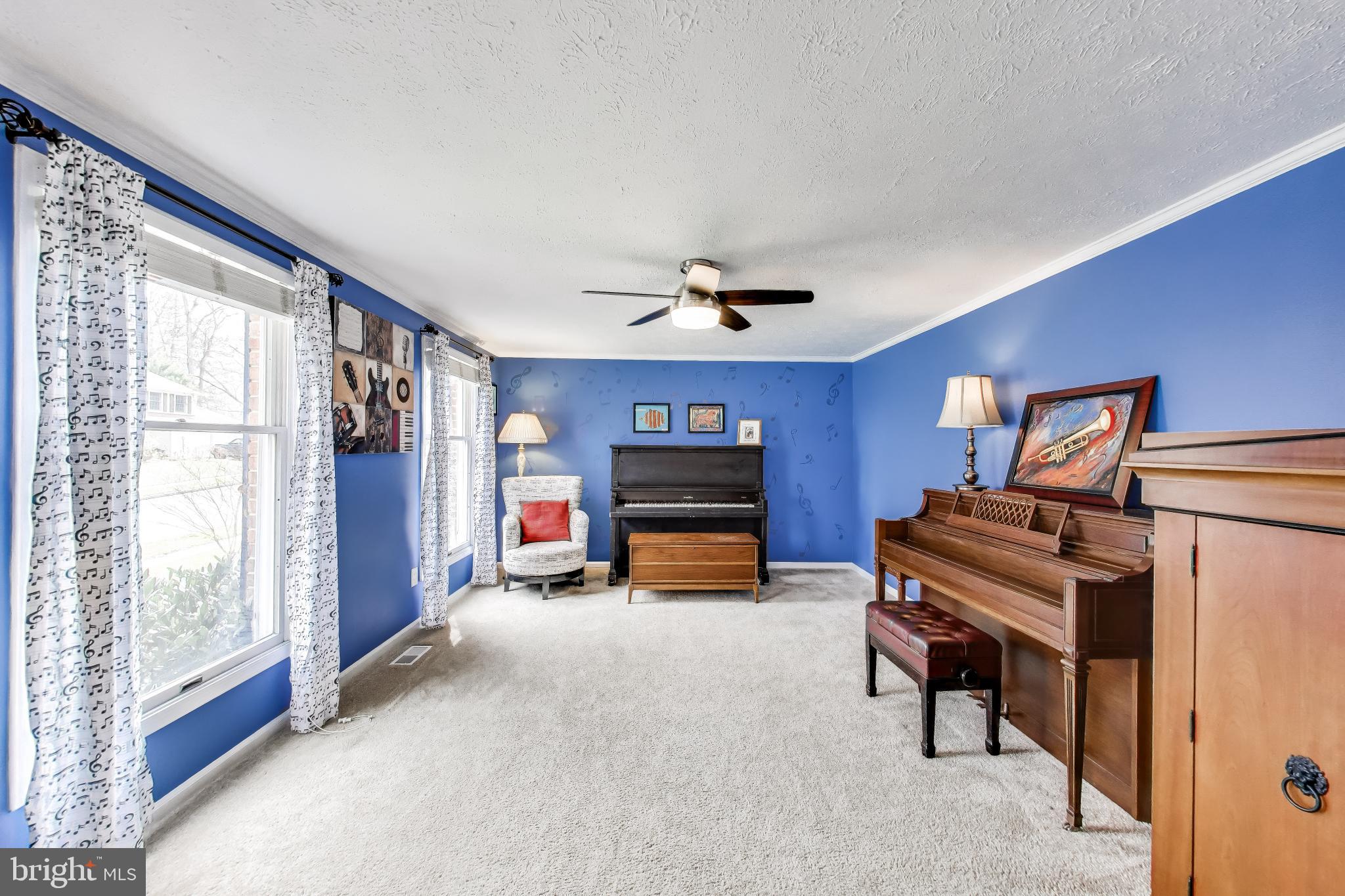 8404 Chillum Court Springfield, VA 22153 - Photo 5 of 56 Vibrant blue walls invite creativity.