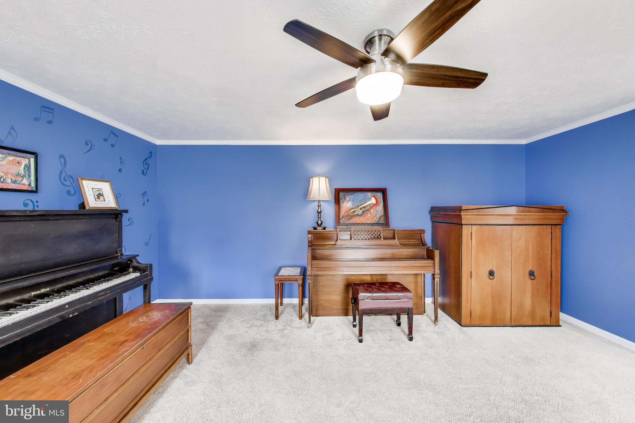 8404 Chillum Court Springfield, VA 22153 - Photo 7 of 56 Musical retreat with vibrant blue walls.