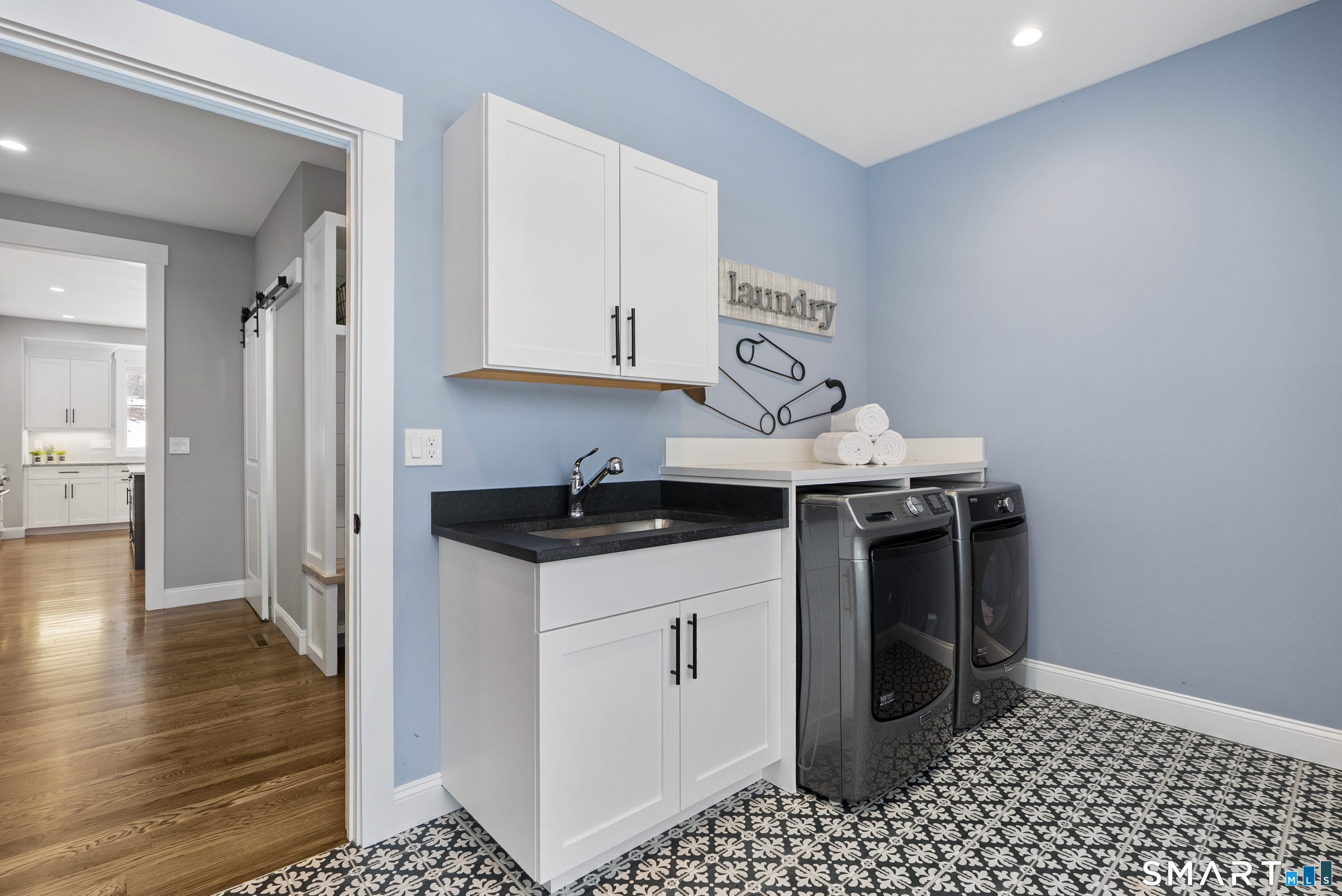 8 Gateshead Way Farmington, CT 06085 - Photo 19 of 39 a kitchen with stainless steel appliances a stove a sink and a refrigerator