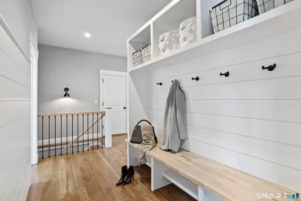 a view of entryway with wooden floor