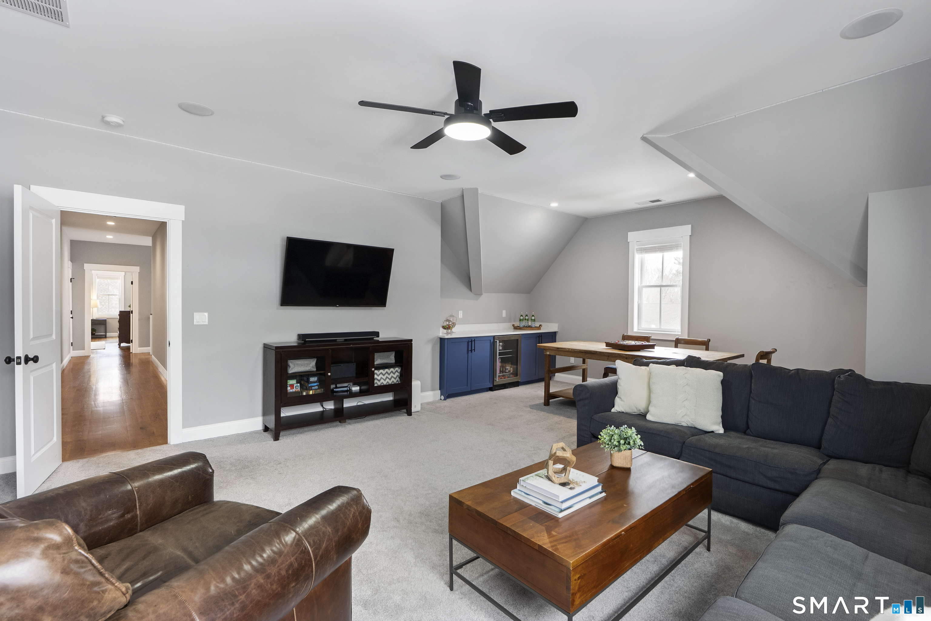 8 Gateshead Way Farmington, CT 06085 - Photo 24 of 39 a living room with furniture and a flat screen tv