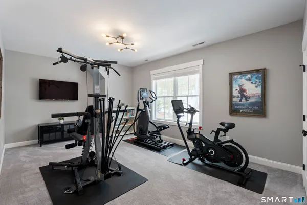 a view of a room with gym equipment