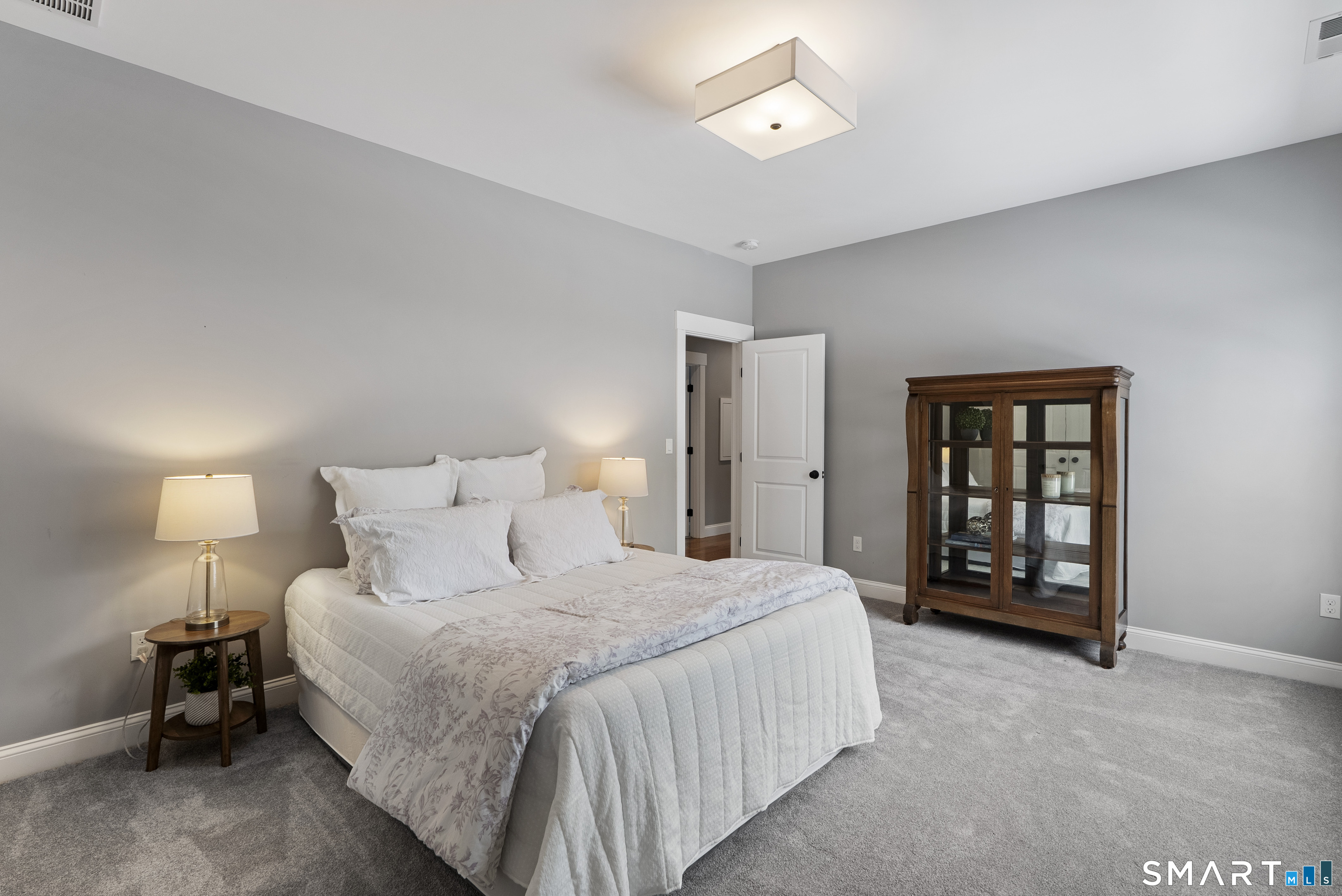 8 Gateshead Way Farmington, CT 06085 - Photo 29 of 39 a bedroom with a bed and a window