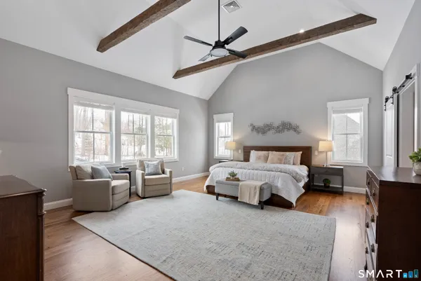 a bed room with a bed and a couch