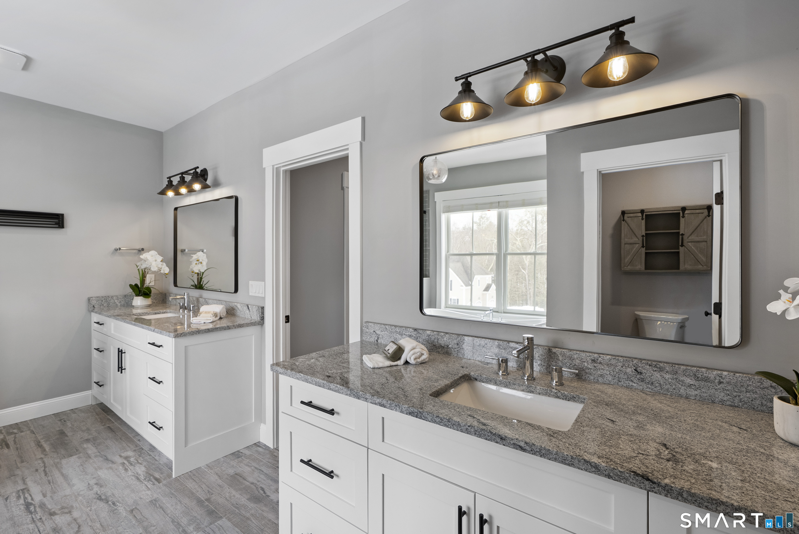 8 Gateshead Way Farmington, CT 06085 - Photo 35 of 39 a bathroom with a sink vanity and mirror