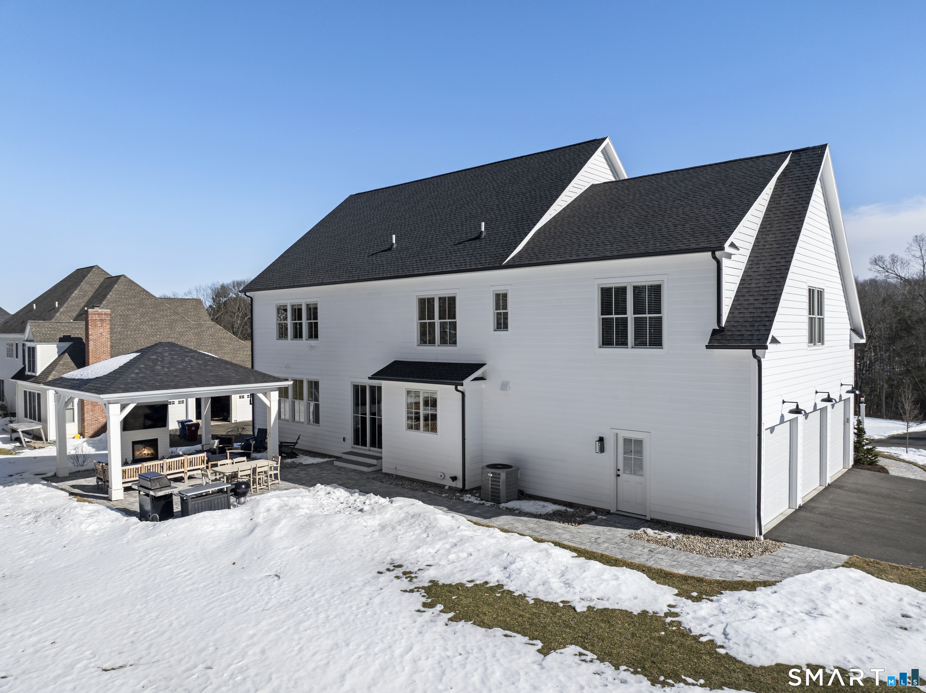 8 Gateshead Way Farmington, CT 06085 - Photo 5 of 39 a front view of a house with a yard