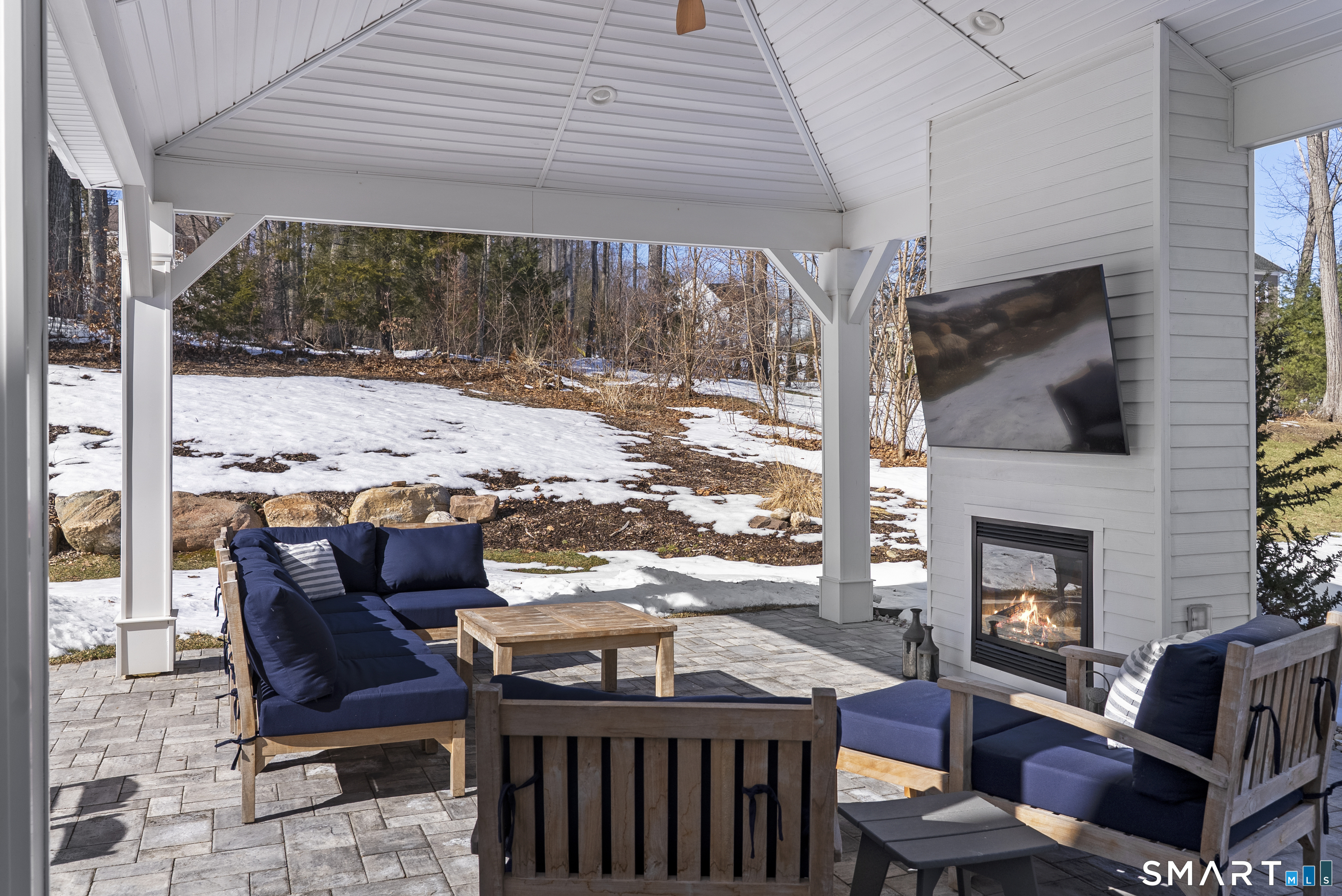 8 Gateshead Way Farmington, CT 06085 - Photo 7 of 39 a outdoor living space with patio furniture and a fireplace