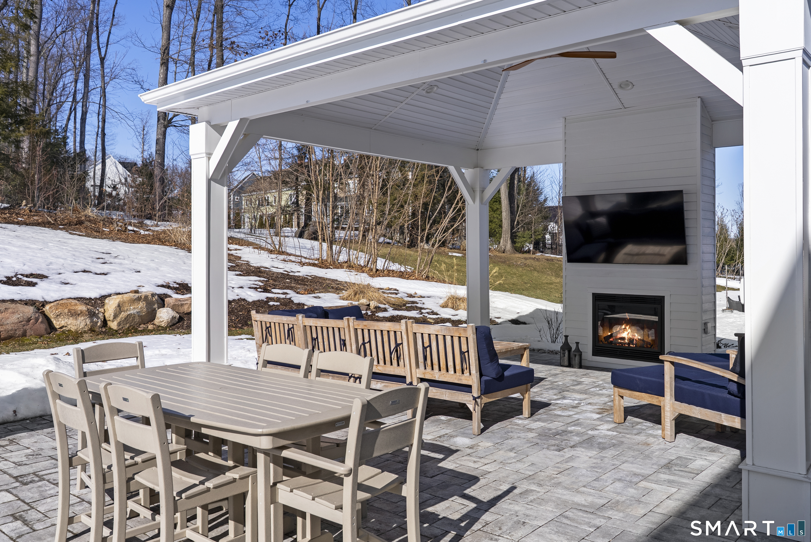 8 Gateshead Way Farmington, CT 06085 - Photo 8 of 39 a view of a patio with a table and chairs