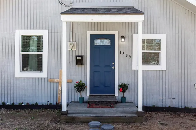 a front view of a house with a shower