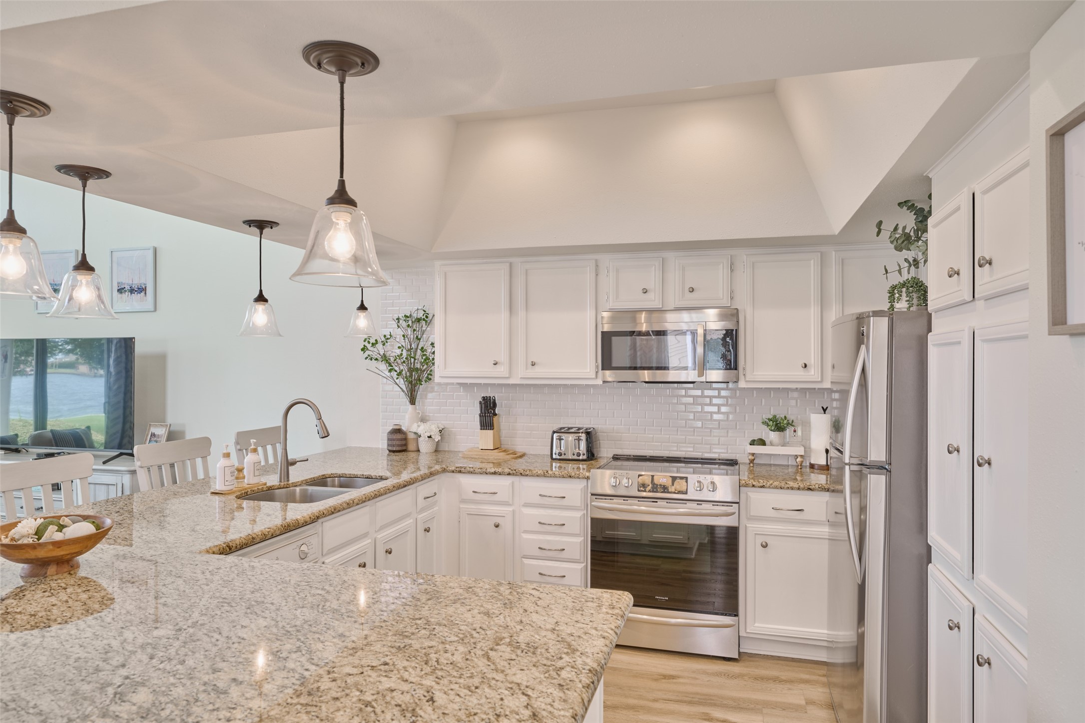 73 April Point Drive South Montgomery, TX 77356 - Photo 17 of 42 Subway tiles, granite counters, stainless steel natural gas appliances, and refinished cabinets, just to name a few updats to this beautiful kitchen.