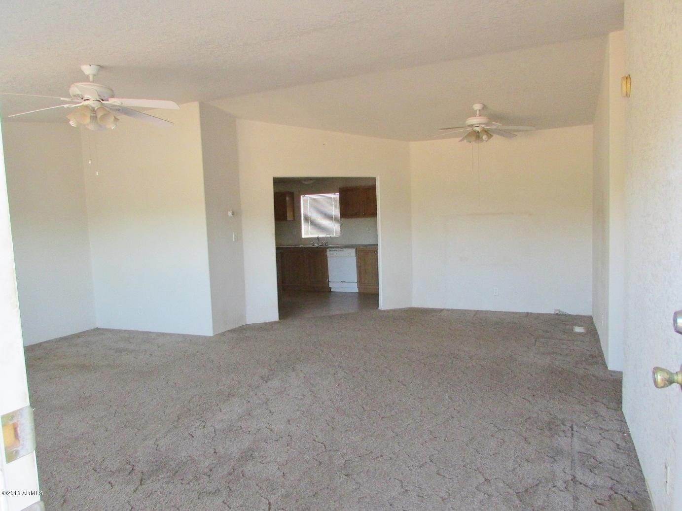 55407 West Ivory Road Maricopa, AZ 85139 - Photo 3 of 48 3_Large Living Room