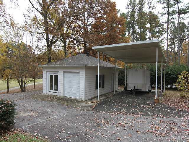 5238 Summit Ridge Drive Durham, NC 27712 - Photo 13 of 14 Detatched one-car Garage w/ Separate Studio/Office. Covered Carport designed for RV. Parking Lot/Garage