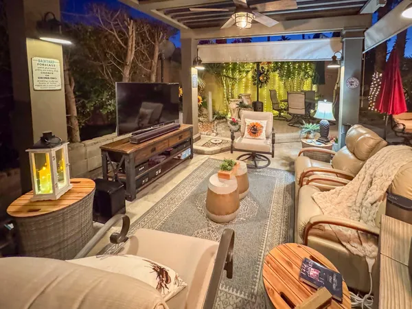 a view of a couch with wooden floor