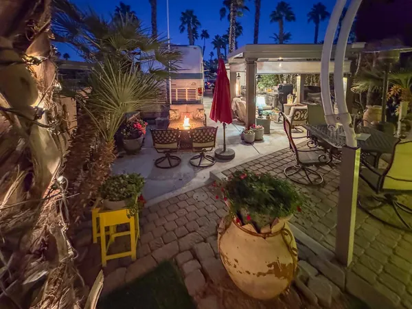 a view of a chairs and tables in patio
