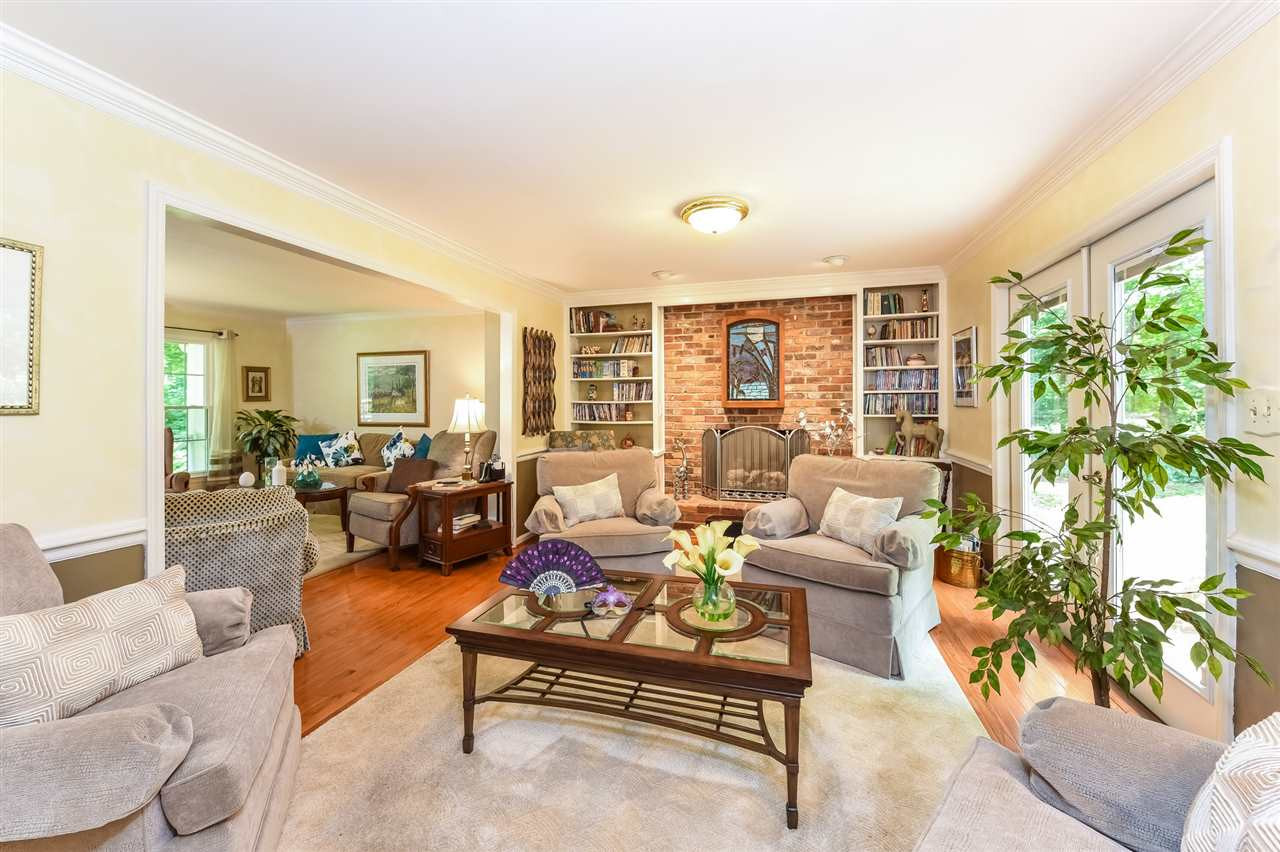 9716 Rock Creek Road Raleigh, NC 27613 - Photo 9 of 25 Family Room Opens into Living Room