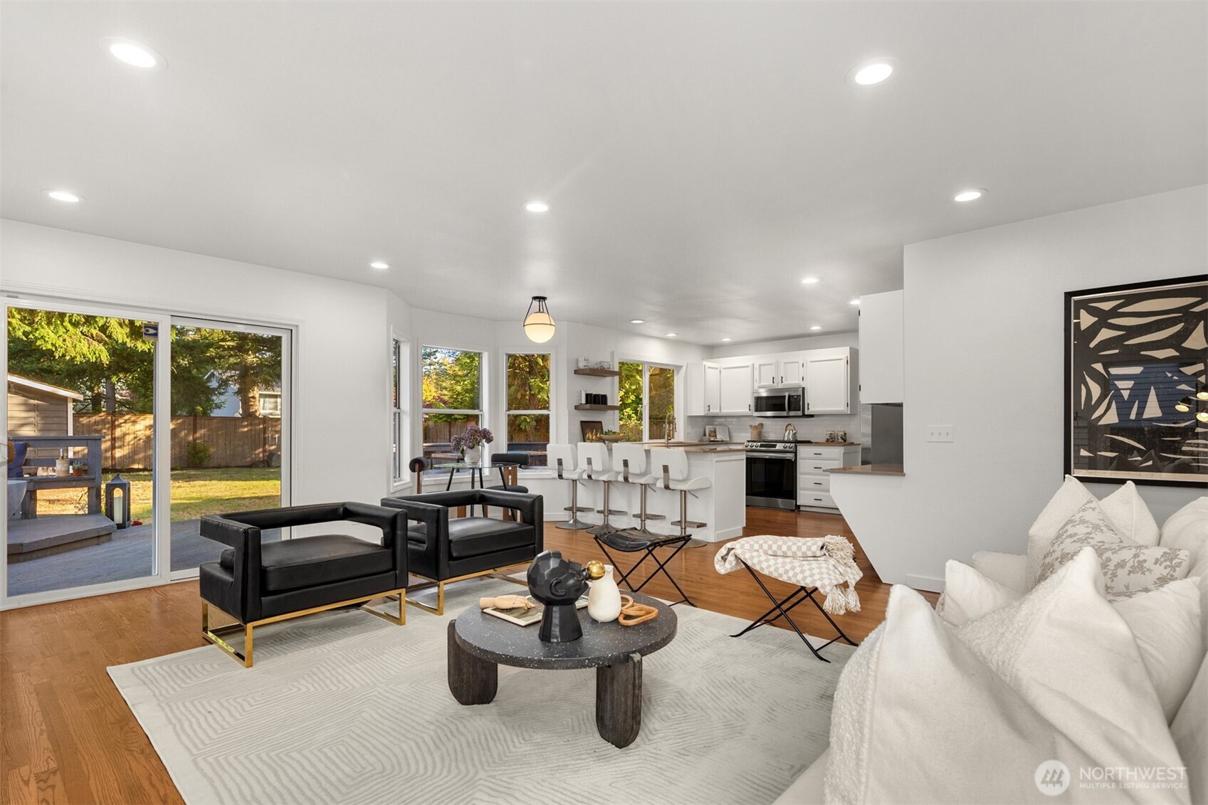 3207 212th Street Southeast Bothell, WA 98021 - Photo 19 of 40 a living room with furniture and a table