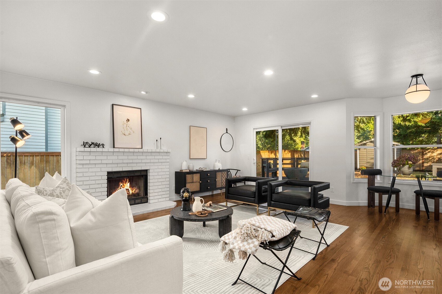3207 212th Street Southeast Bothell, WA 98021 - Photo 20 of 40 a living room with furniture fireplace and window