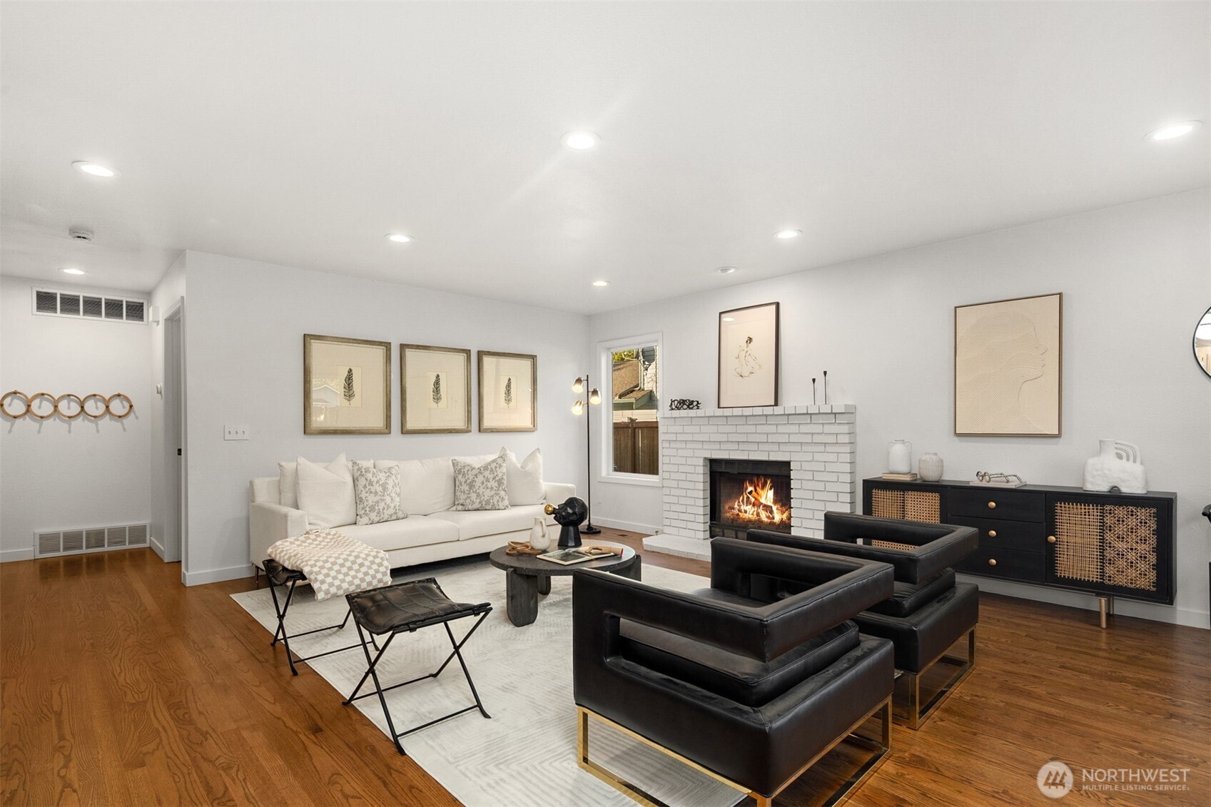 3207 212th Street Southeast Bothell, WA 98021 - Photo 21 of 40 a living room with furniture and a fireplace