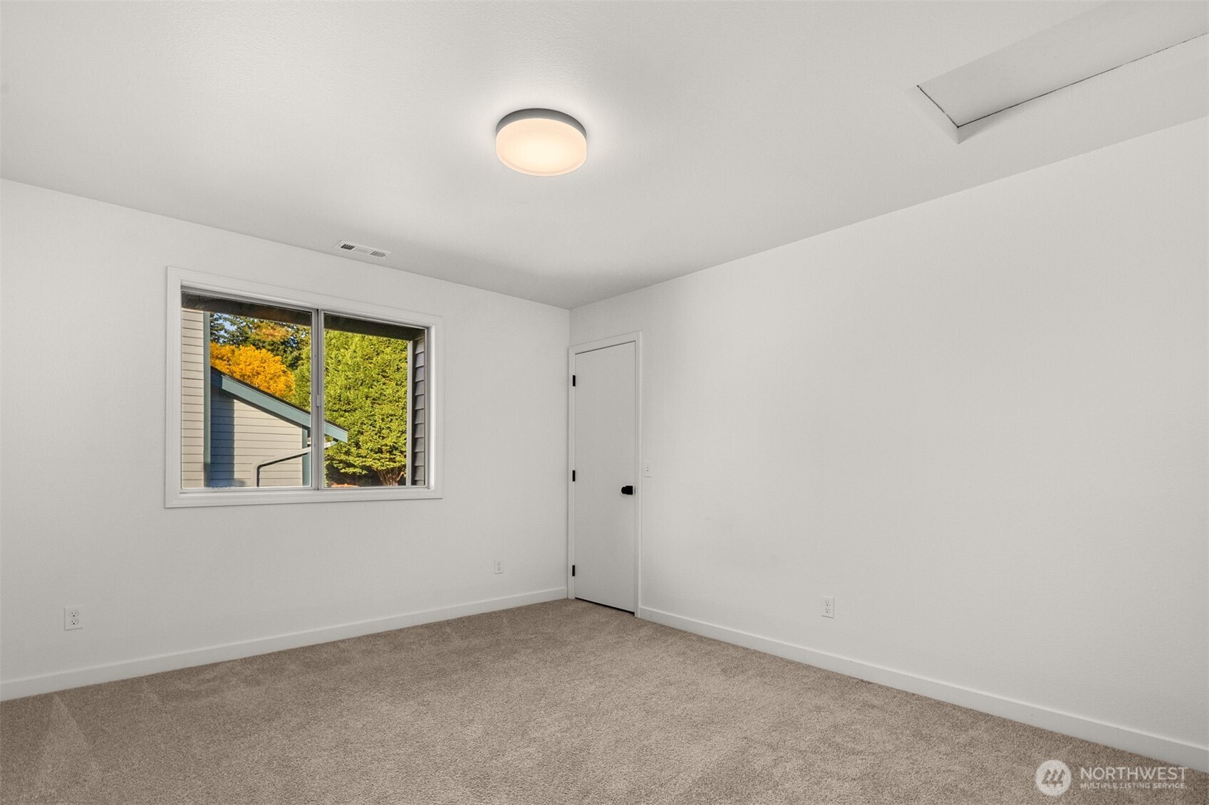 3207 212th Street Southeast Bothell, WA 98021 - Photo 27 of 40 an empty room with a window