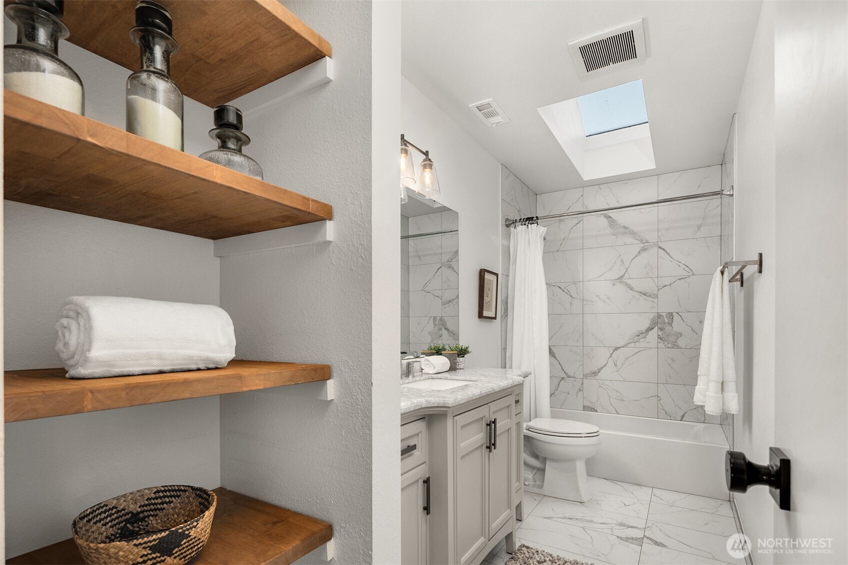 3207 212th Street Southeast Bothell, WA 98021 - Photo 28 of 40 a bathroom with a granite countertop sink a toilet and shower