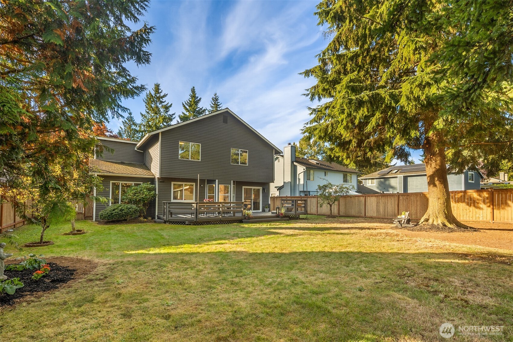 3207 212th Street Southeast Bothell, WA 98021 - Photo 37 of 40 a front view of a house with a yard