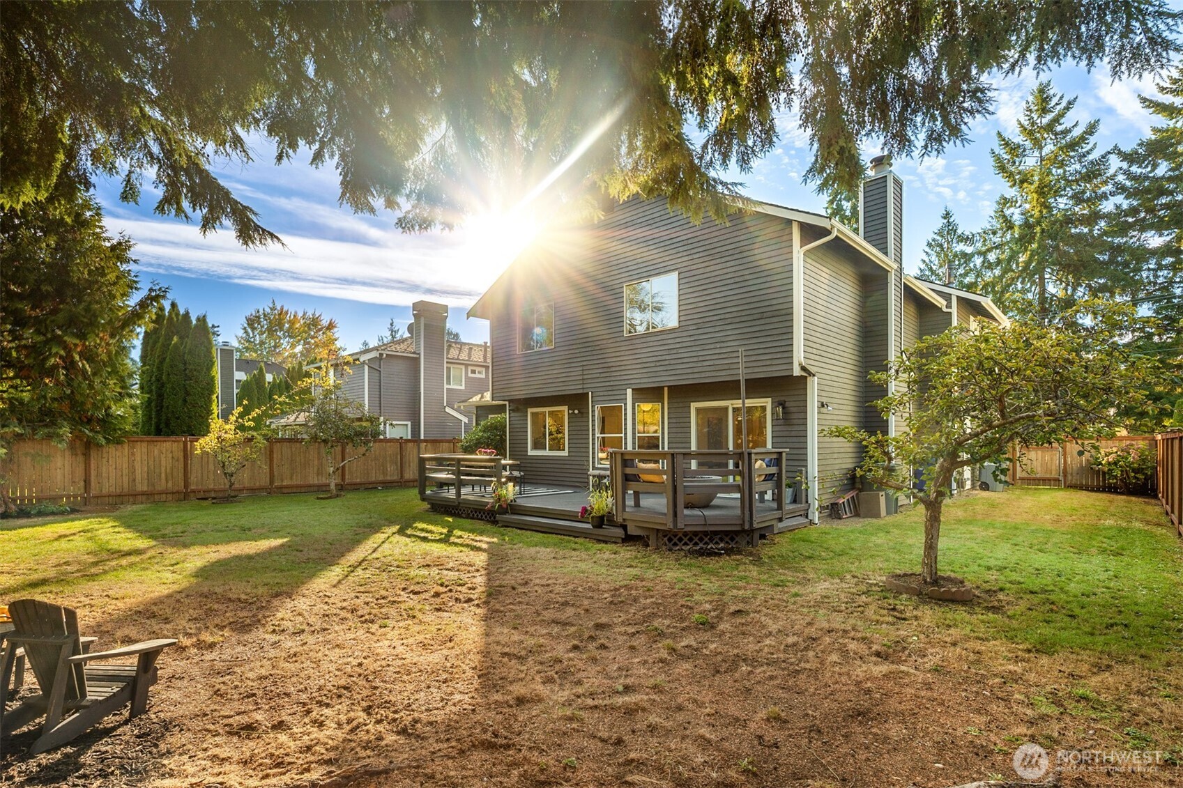 3207 212th Street Southeast Bothell, WA 98021 - Photo 38 of 40 a view of a house with backyard and sitting area