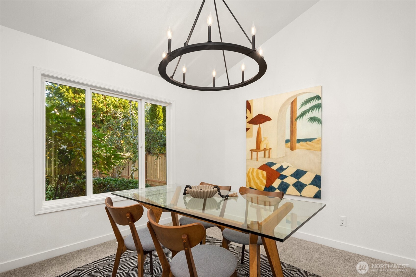 3207 212th Street Southeast Bothell, WA 98021 - Photo 10 of 40 a view of a dining room with furniture wooden floor and a window