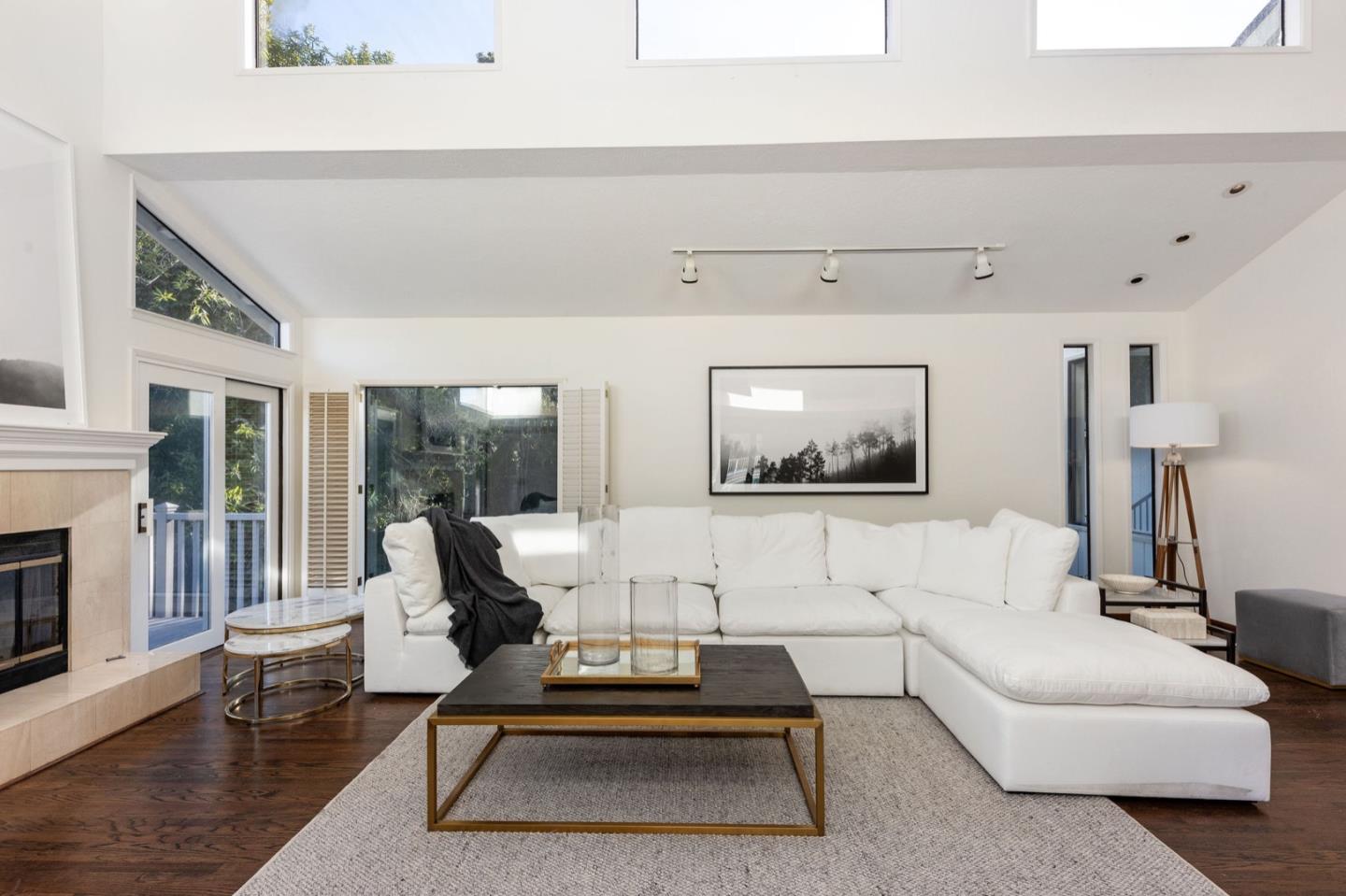 440 Remillard Drive Hillsborough, CA 94010 - Photo 12 of 47 a living room with furniture and a flat screen tv
