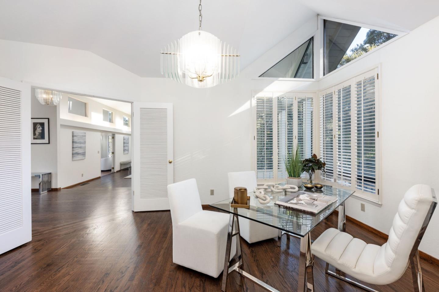 440 Remillard Drive Hillsborough, CA 94010 - Photo 14 of 47 a view of a dining room with furniture window and wooden floor