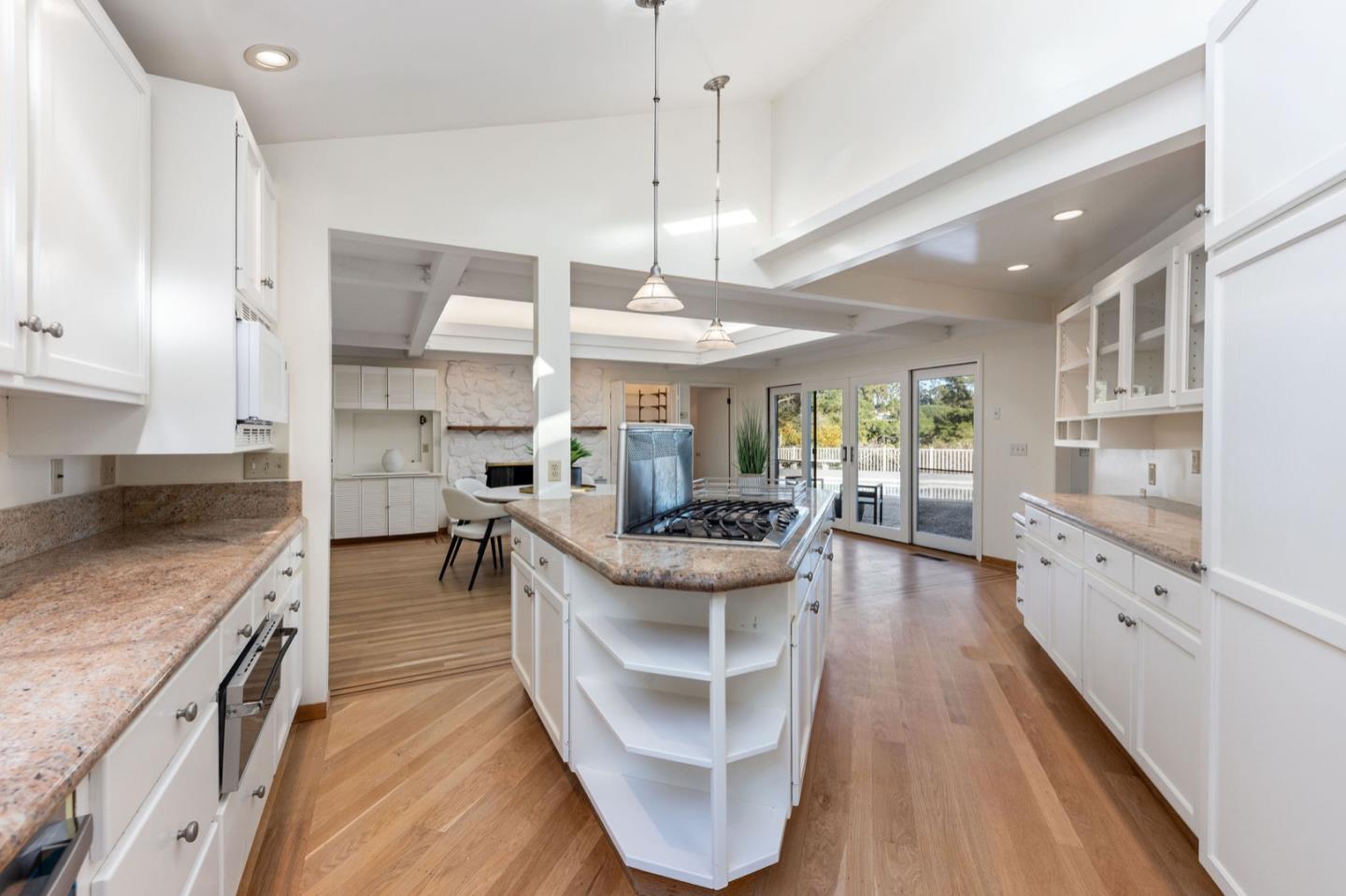 440 Remillard Drive Hillsborough, CA 94010 - Photo 18 of 47 a kitchen with stainless steel appliances granite countertop a stove oven and a granite counter tops with white cabinets