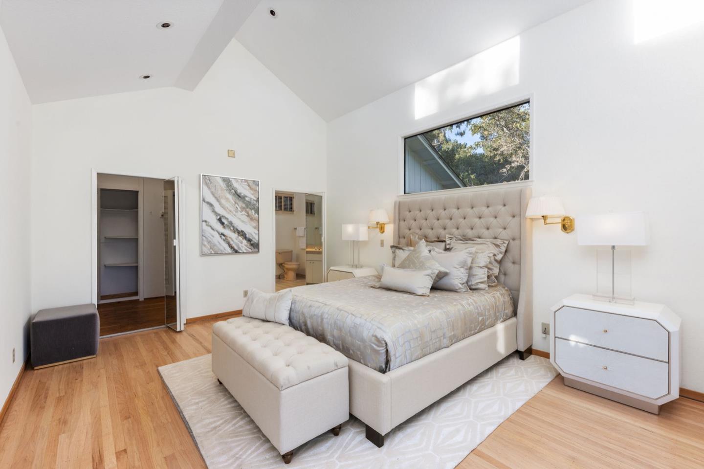 440 Remillard Drive Hillsborough, CA 94010 - Photo 30 of 47 a bedroom with a bed and a couch