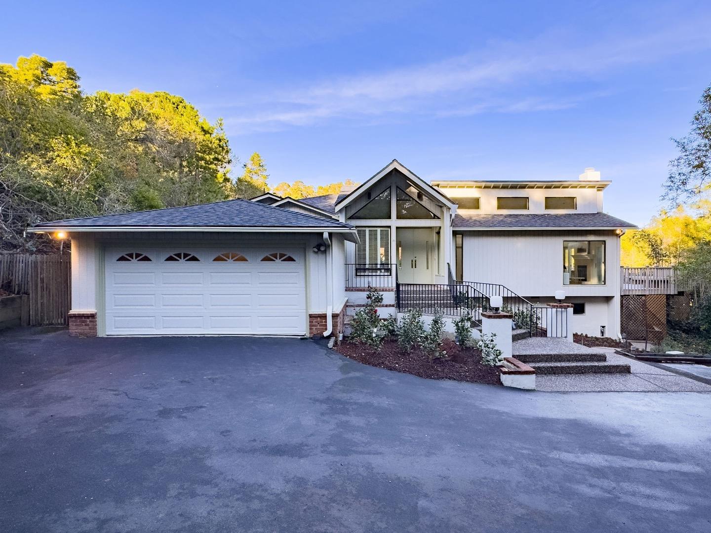 440 Remillard Drive Hillsborough, CA 94010 - Photo 3 of 47 a view of a house with a yard and sitting area