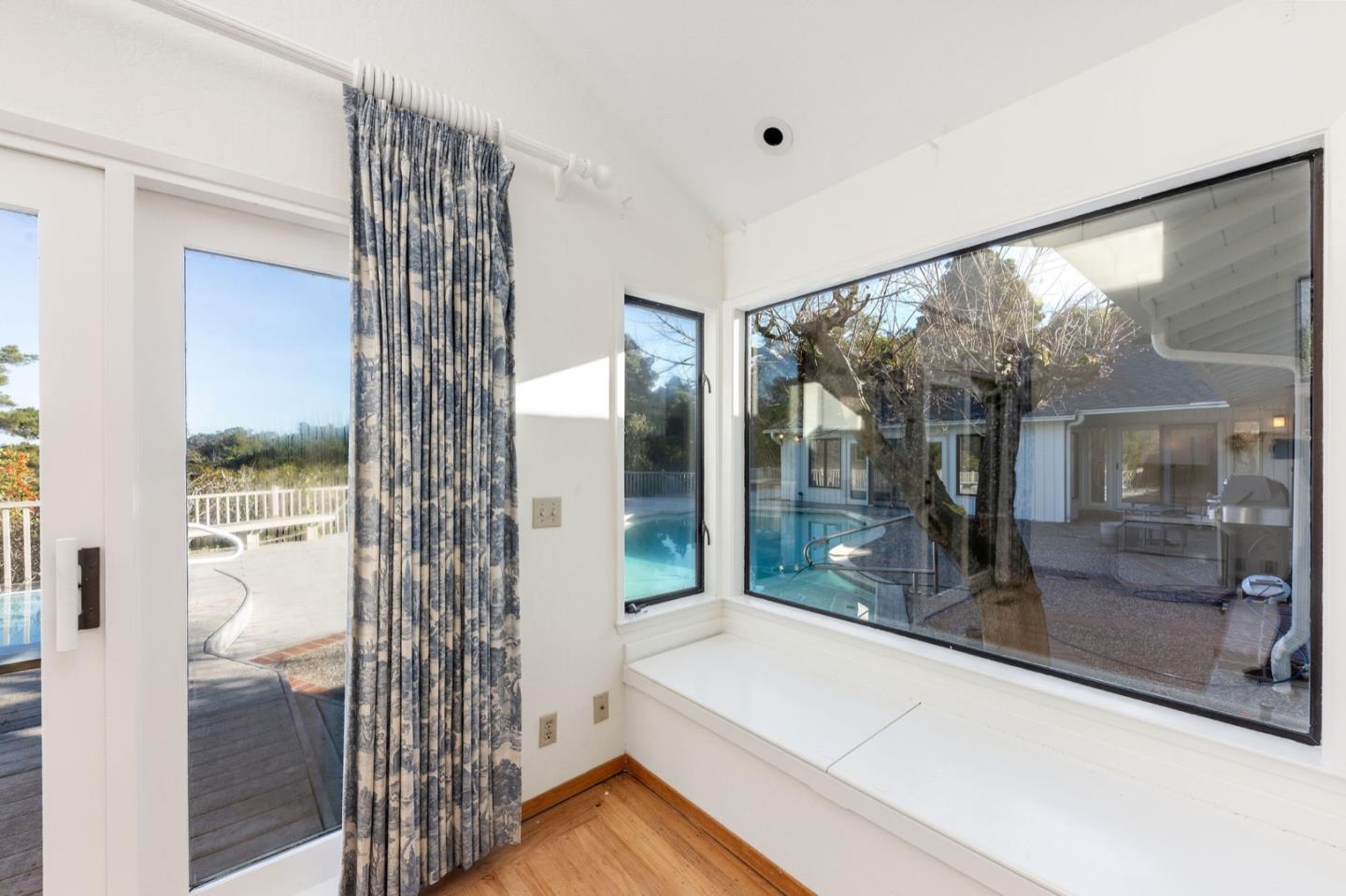 440 Remillard Drive Hillsborough, CA 94010 - Photo 32 of 47 a very nice looking room with a large window and a bath tub