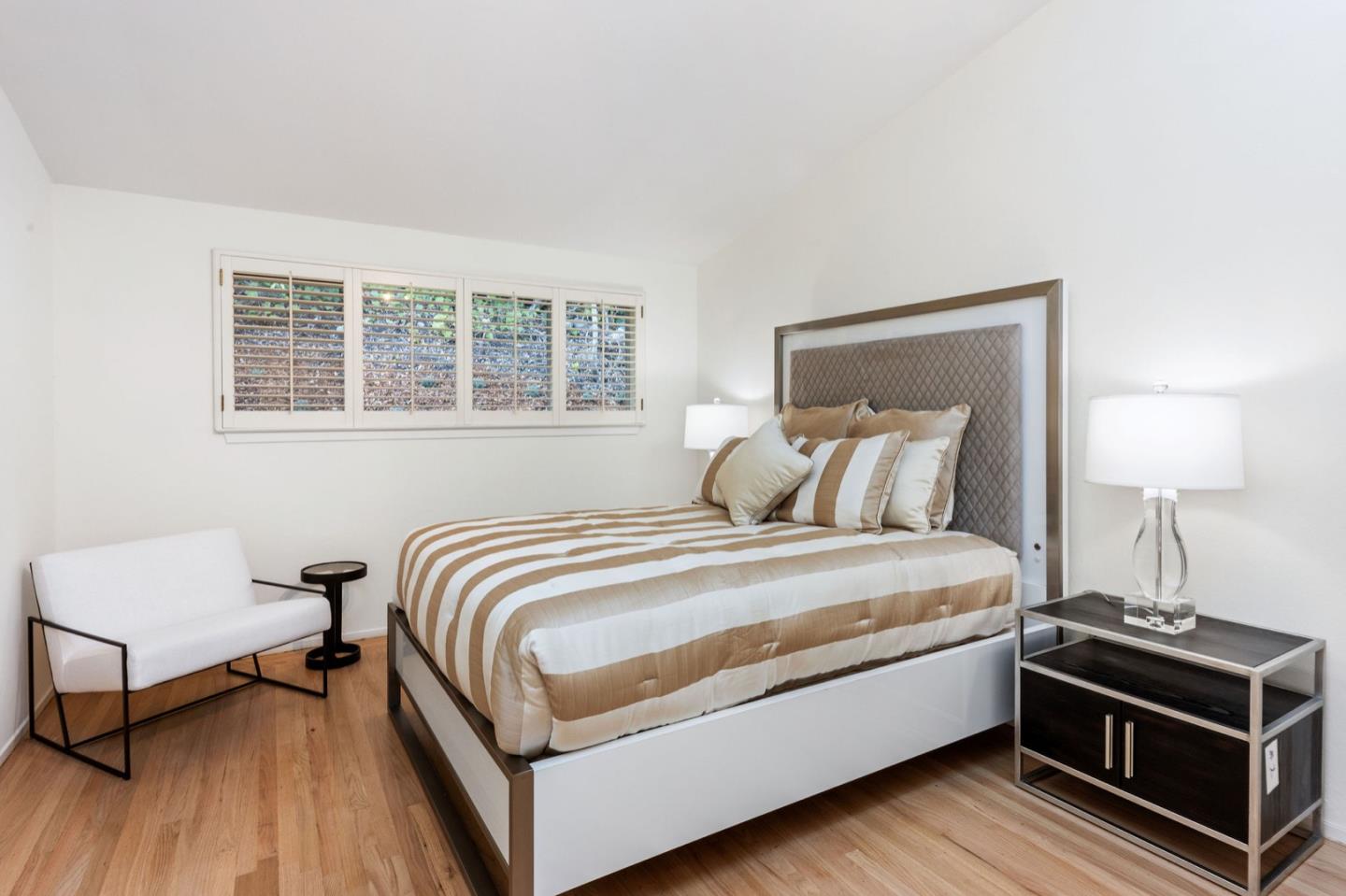 440 Remillard Drive Hillsborough, CA 94010 - Photo 35 of 47 a bed room with a bed and a lamp